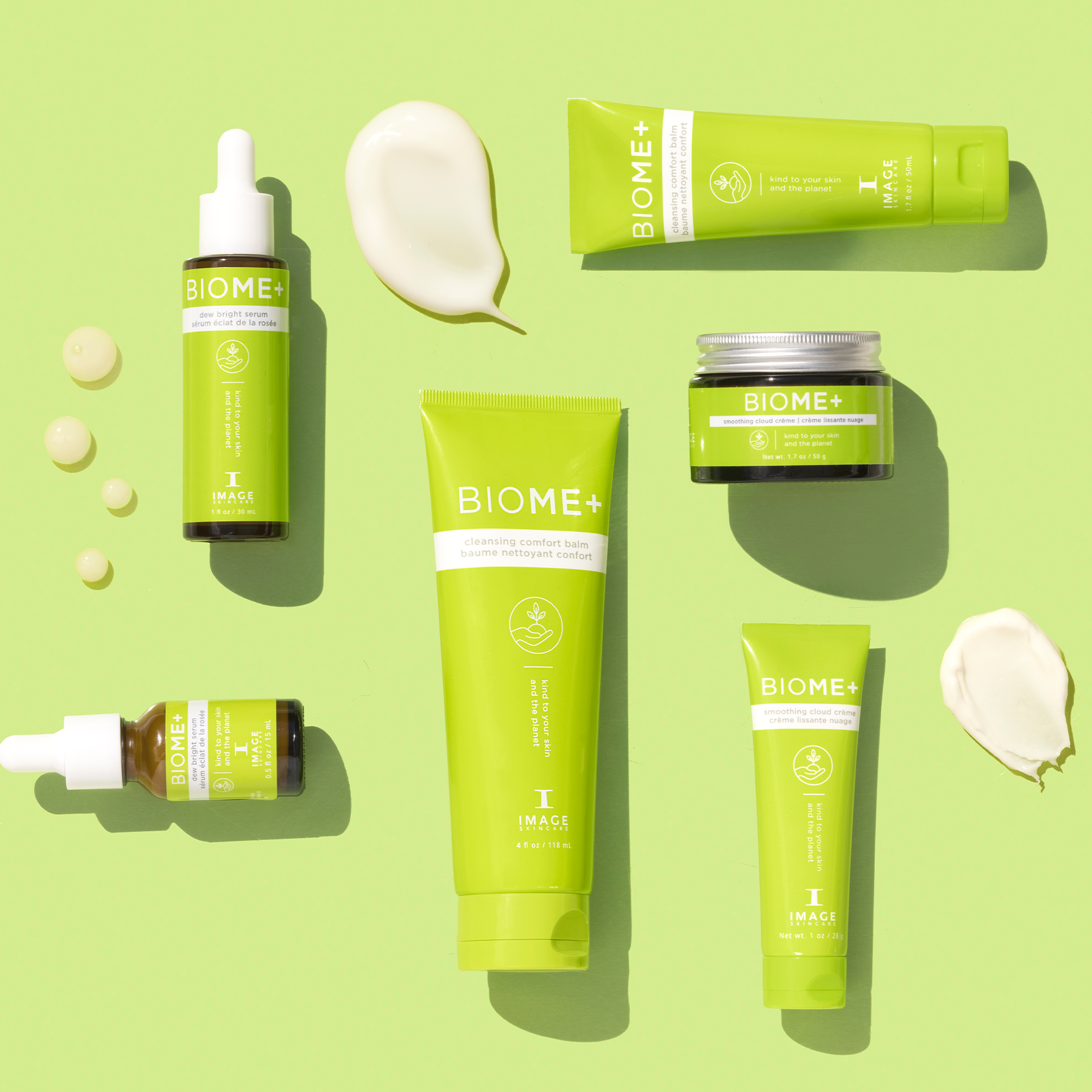 Full BIOME+ collection of retail and travel size products on green background
