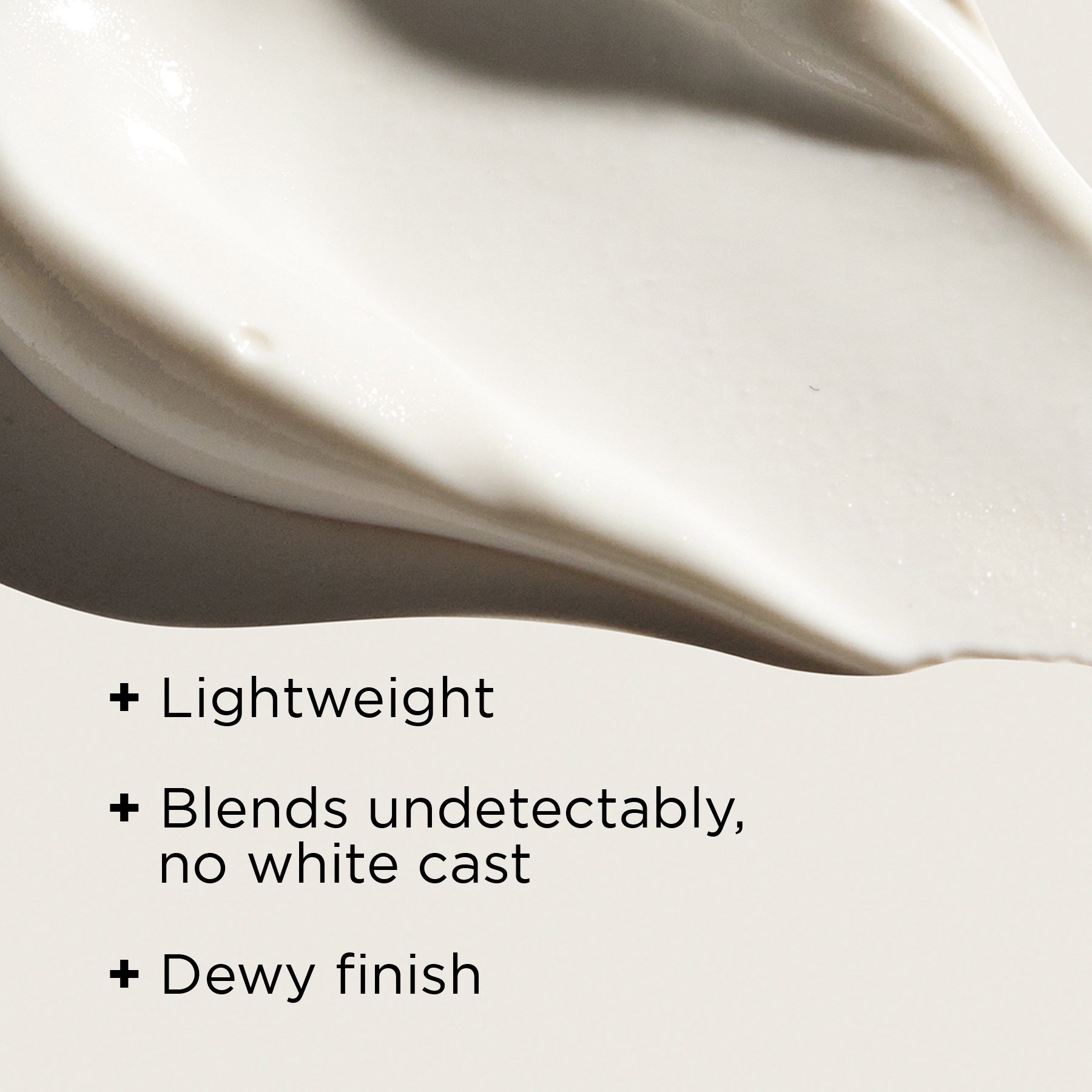 benefits listed on white background of moisturizer close up