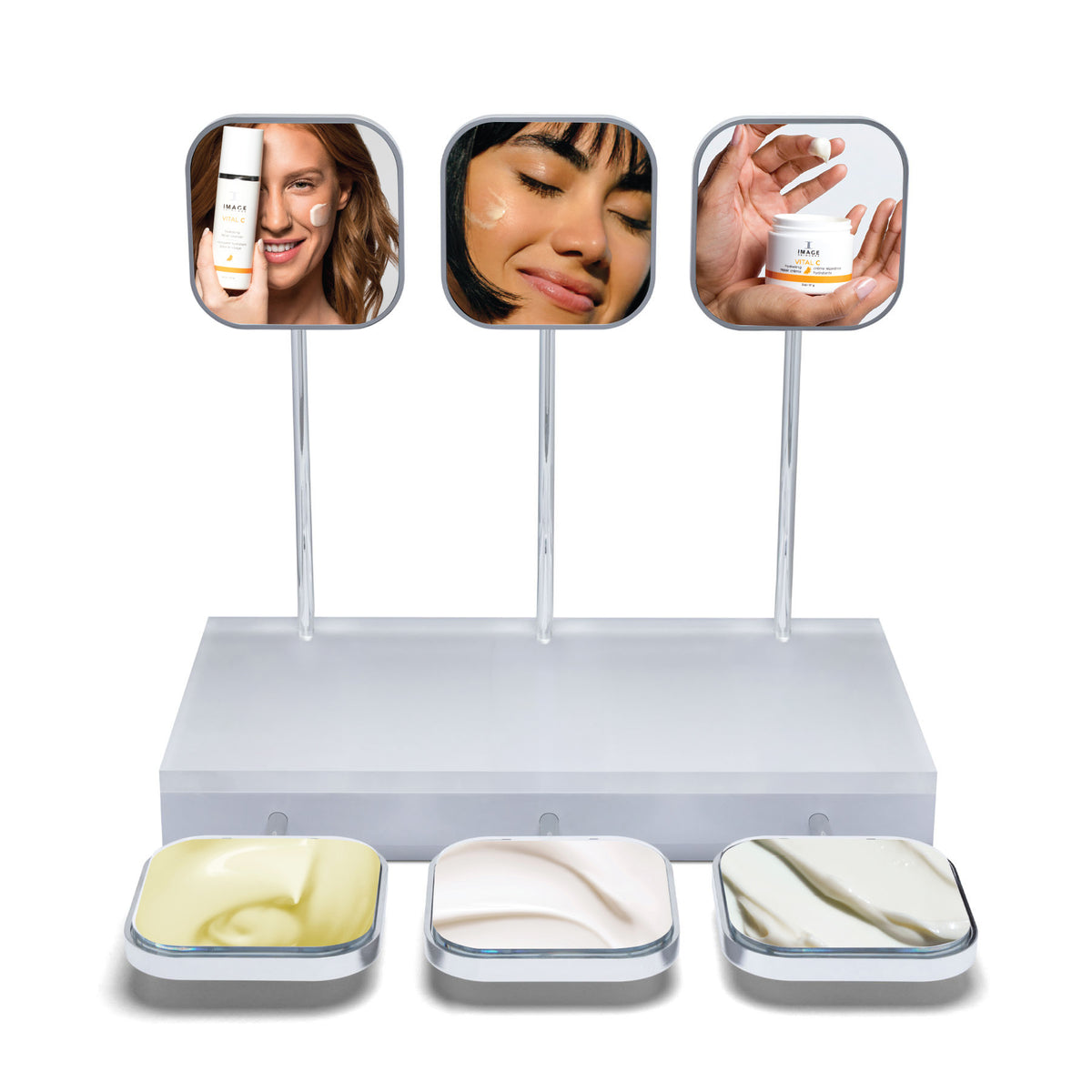 Display stand with mirrors and cosmetic products on a white background