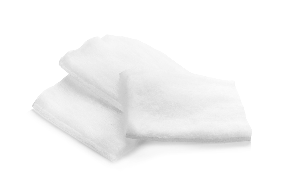 A stack of white cotton gauzes