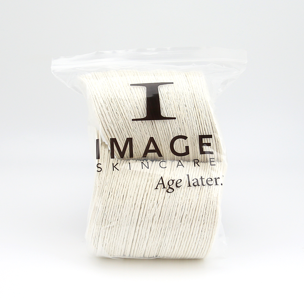 A pack of IMAGE Skincare compressed facial sponges in a clear plastic packaging with the brand's logo and tagline 'Age later.'.