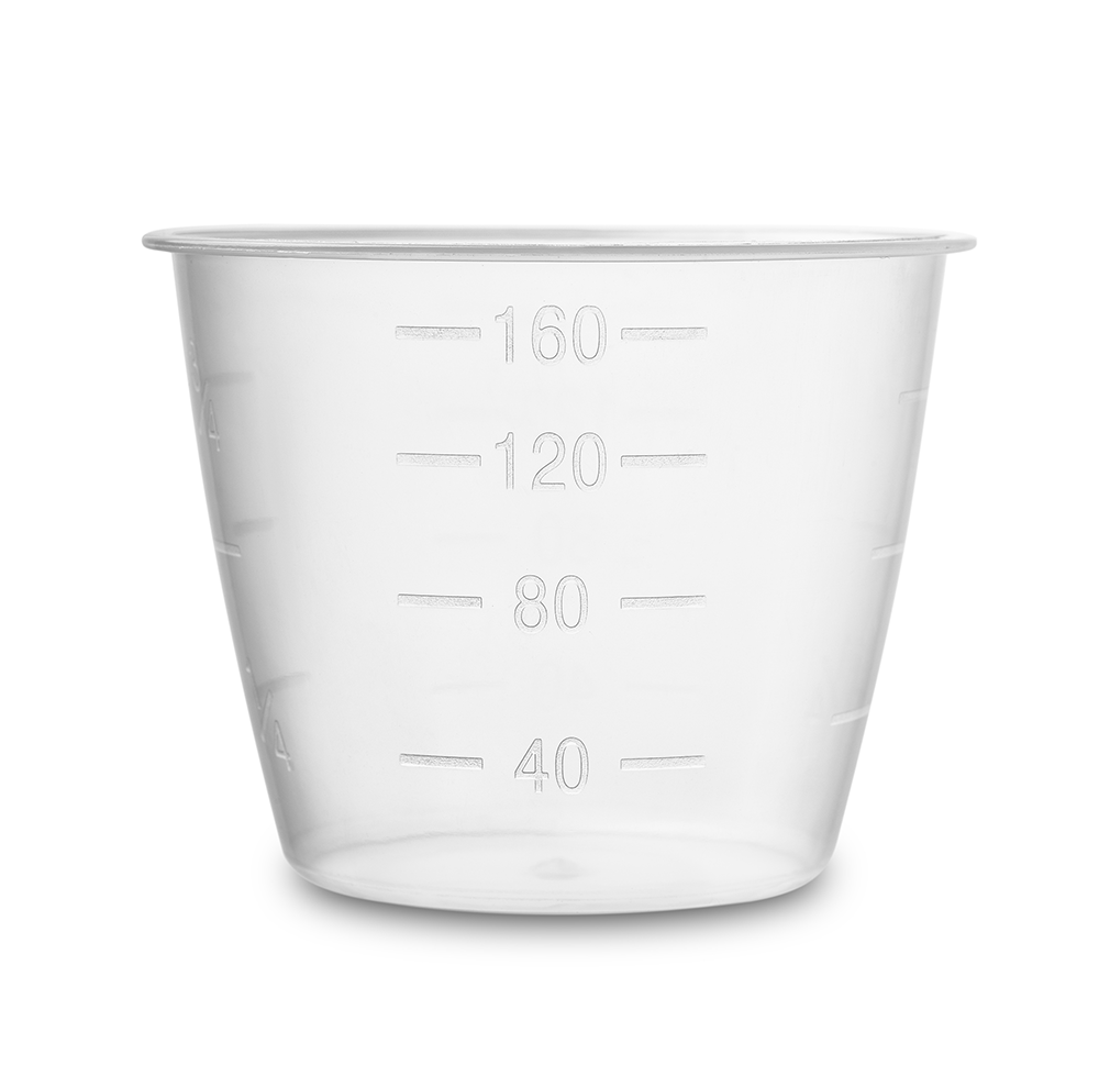A clear plastic medicine cup with measurement markings.
