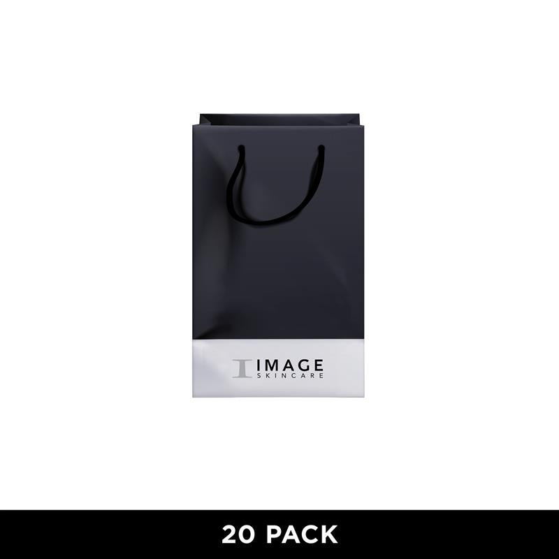 Black Image Skincare packaging with a handle on a white background