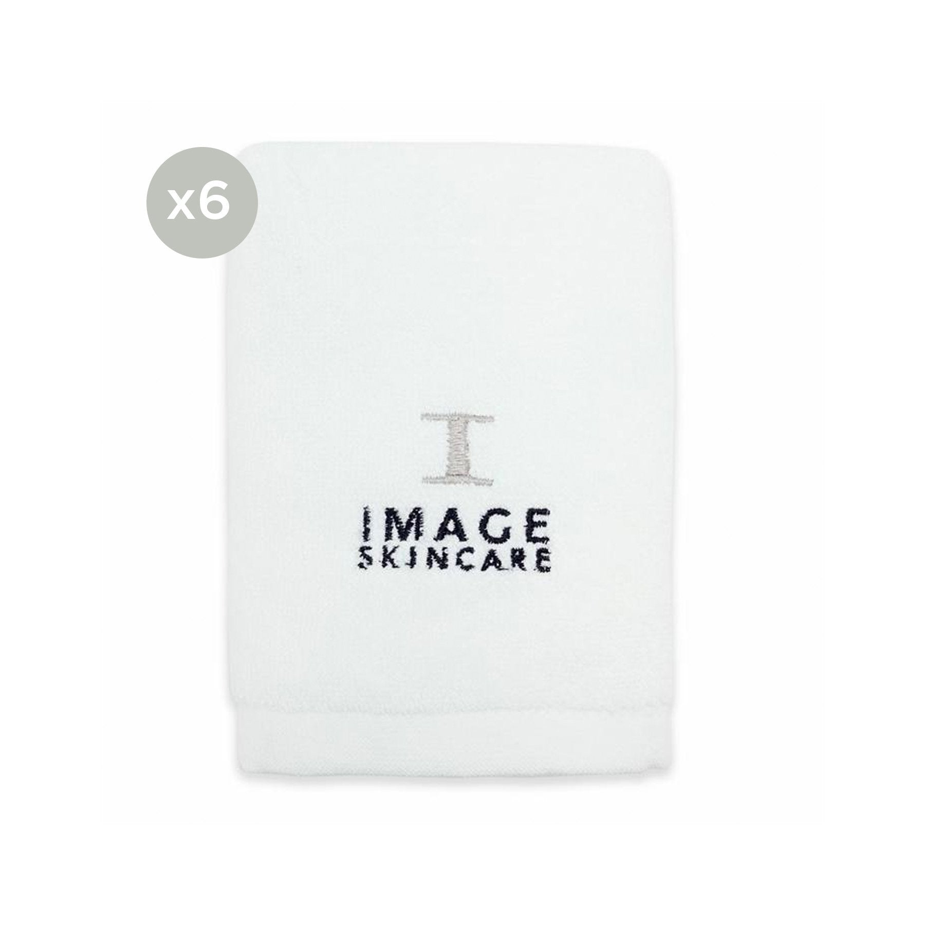 A pack of 6 white hand towels with the IMAGE Skincare logo embroidered in the center